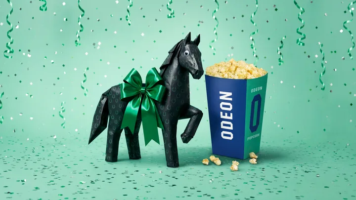 The wrapped black horse beside an ODEON popcorn box